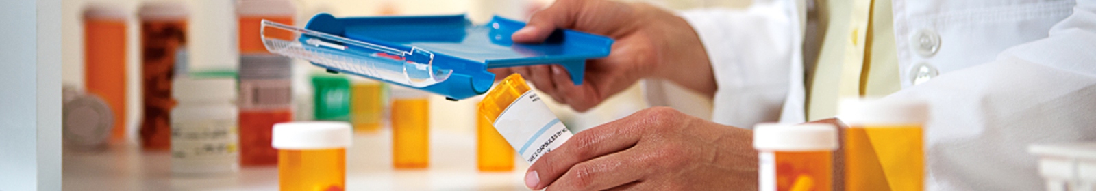 A pharmacist filling a perscription.